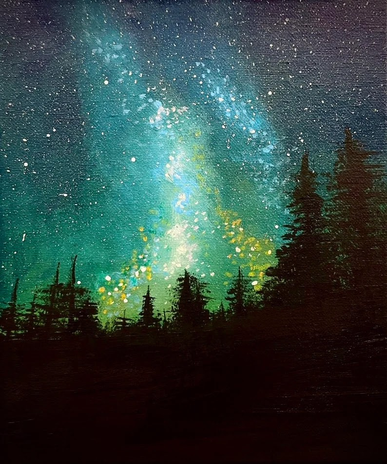 Green and turquoise light fills a starry sky above a dark forest of evergreen trees.