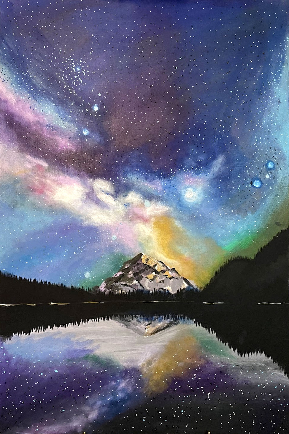 A snowy mountain reflected in a still lake under a star-filled blue, violet, pink and golden galaxy.